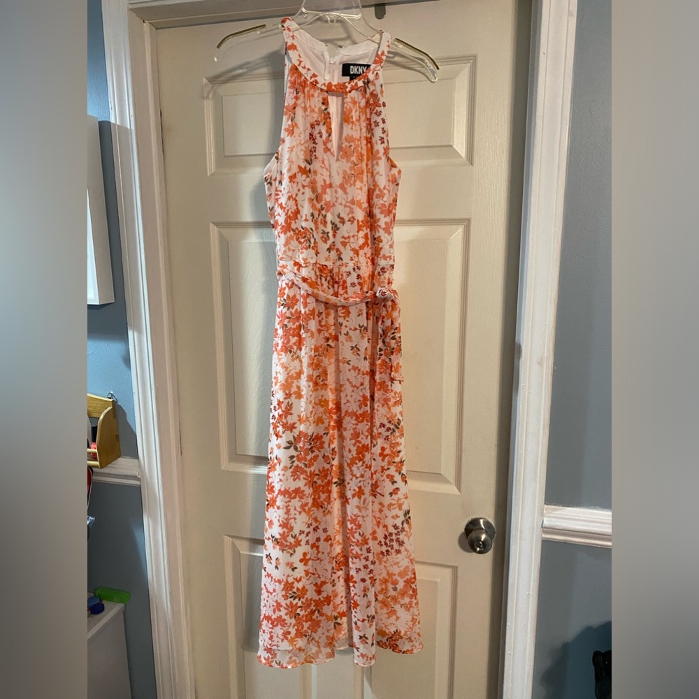 Beautiful spring dress.  Floral print in peach and coral.